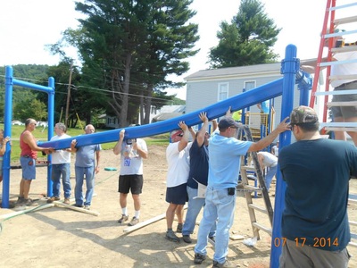 volunteers building playground photo